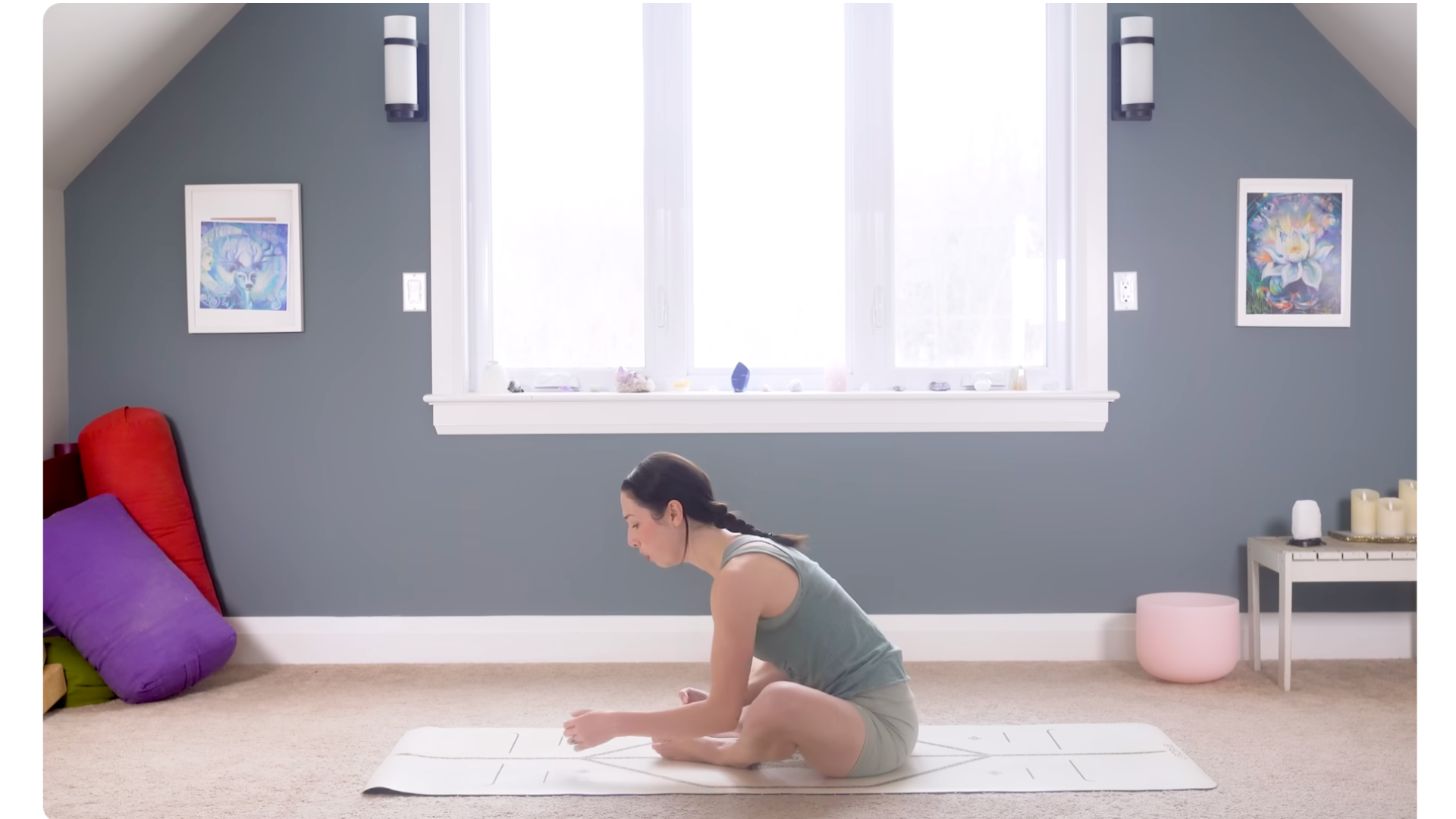Woman leaning forward with her back straight during 15-minute morning yoga